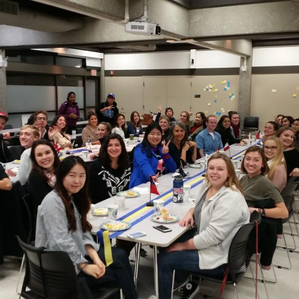 Lots of students sitting at tables