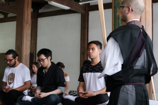 group of students mediating in Japan
