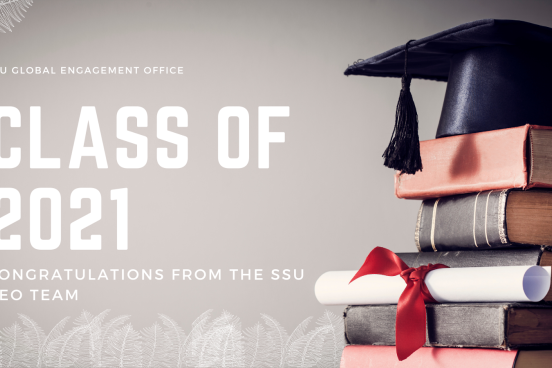 Background image shows a stack of books with a graduation cap and diploma sitting atop; text offers a congratulations to the class of 2021 