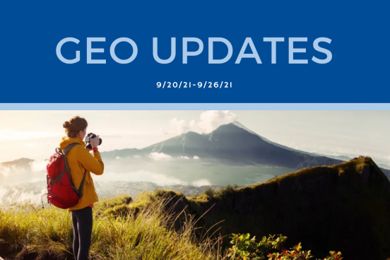 Bottom half is a photo of a person taking a photo of a mountain range from the top of another mountain; top half says "GEO Updates"