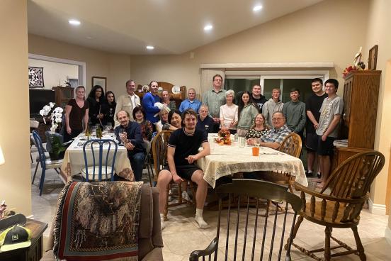 David sits surrounded by American family