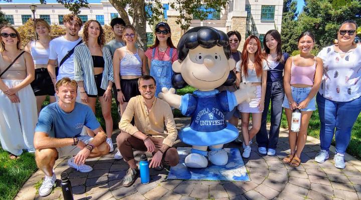 group of new international students on campus during orientation