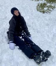 Rawan sitting in snow