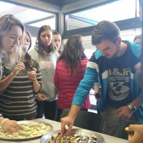 Students eating cheese.