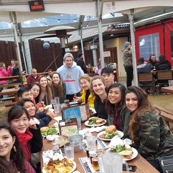 Students gathered eating.