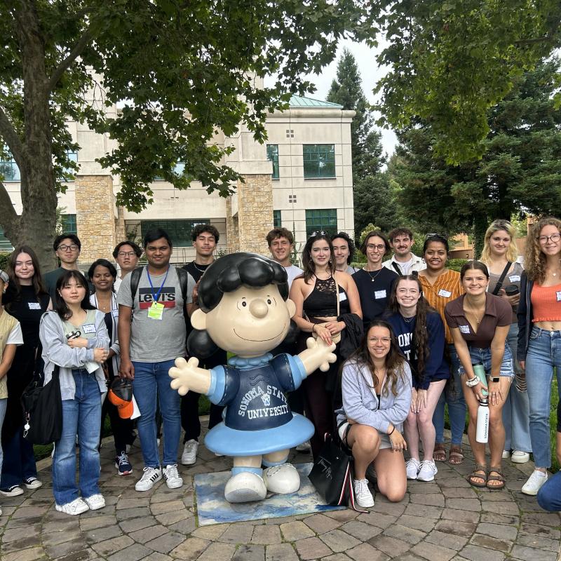 Fall 2023 International Students with Lucy Statue