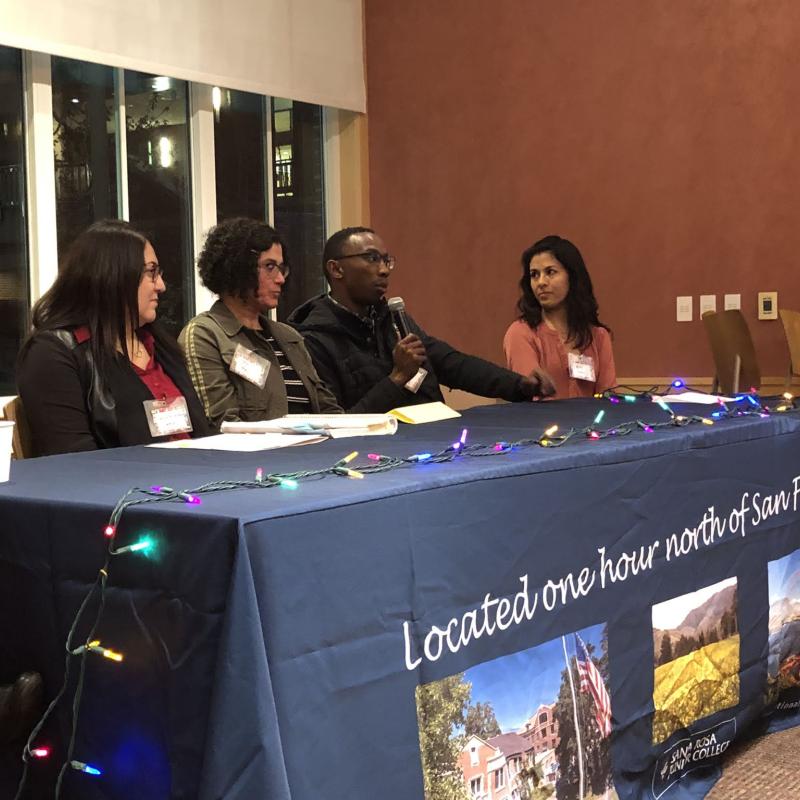 international students on a panel speaking