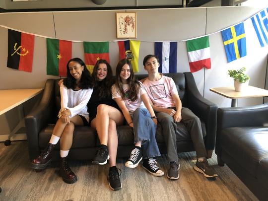 Four ambasadors sitting on couch