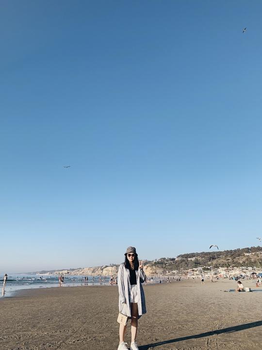 Jiayi "Emily" on a San Diego beach